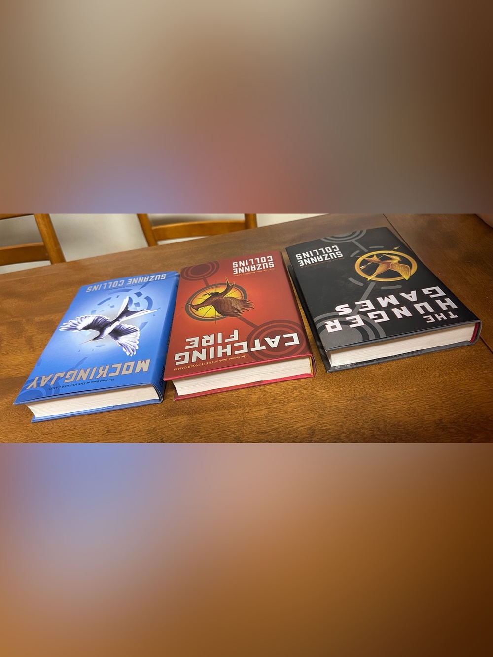 The Hunger Games, Catching Fire, and Mockingjay Novels By Suzanne Collins - Picture 4 of 8